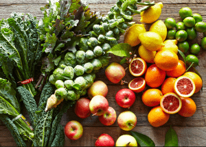 a group of fruits and vegetables on a wood surface Healthy Weight Loss Diets Knowle Grove